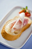 Ham on a slice of white bread
