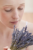 Young woman with dried lavender