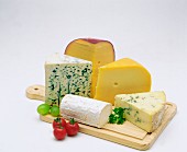 Various types of cheese on a board