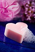 Heart-shaped bar of soap with lather