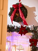 Advent wreath with red bow on a wall