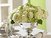 Roses and hydrangeas in a silver bowl