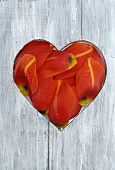 Tulip petals in heart shape cut in wood