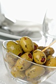 Marinated olives in glass dish