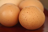 Several brown eggs