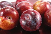 Several red plums