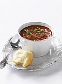 Gazpacho in a soup bowl with white bread