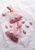 Sugared almonds in small fabric bags to give as gifts