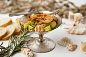 Fried fennel with salmon, prawns and rosemary