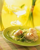 Sole rolls in white wine sauce with herbs