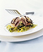 Chicken breast with tapenade on leeks
