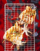 Squid skewers on a barbecue