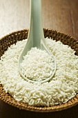 Sticky rice in basket with spoon