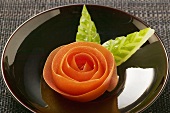 Tomato rose and carved cucumber leaves