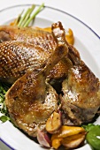Roast goose pieces with garlic 