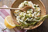Lemon risotto with pine nuts, herb oil and rosemary