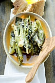 Leeks with grated cheese, white bread