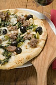 Pizza with tuna, chard and olives