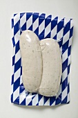 Two Weisswurst in packaging