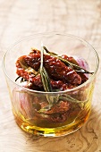 Dried tomatoes with rosemary, garlic and olive oil