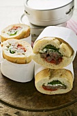 Sandwich rolls filled with pork and peppers