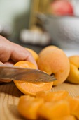 Cutting up apricots