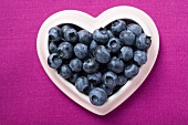 Blueberries in heart-shaped dish