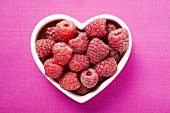 Raspberries in heart-shaped dish