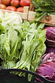 Fresh spinach and radicchio at a market