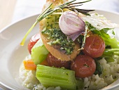 Risotto with vegetables, crostini, pesto and rosemary