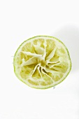 Half a lime, squeezed (overhead view)