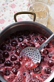 Making cherry jam