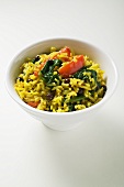 Saffron rice with currants, spinach and peppers