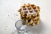 Small waffles with icing sugar