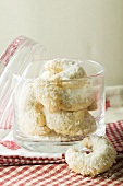 Vanilla crescents with grated coconut in glass jar