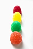 Coloured jelly sweets in a row