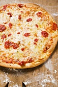 Pizza Margherita on chopping board