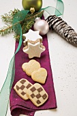 Assorted Christmas biscuits on purple cloth