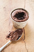 Small chocolate soufflé filled with chocolate sauce