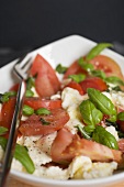 Tomatoes with mozzarella and basil