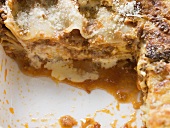 Mince lasagne, a portion taken (close-up)
