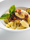 Tortellini with tomato sauce, basil and Parmesan