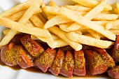 Currywurst (sausage with ketchup & curry powder) & chips (detail)