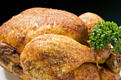 Spicy roast chicken, garnished with parsley