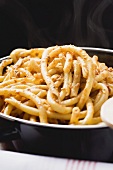 Macaroni with mince sauce in pan (detail)