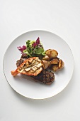 Surf and Turf (beef steak and prawn) with fried potatoes