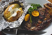 Grilled beef steak with baked potato