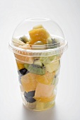 Fruit salad in a plastic beaker