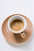 Cup of espresso with crema (overhead view)