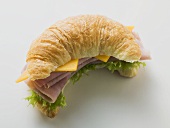 Croissant filled with ham and cheese